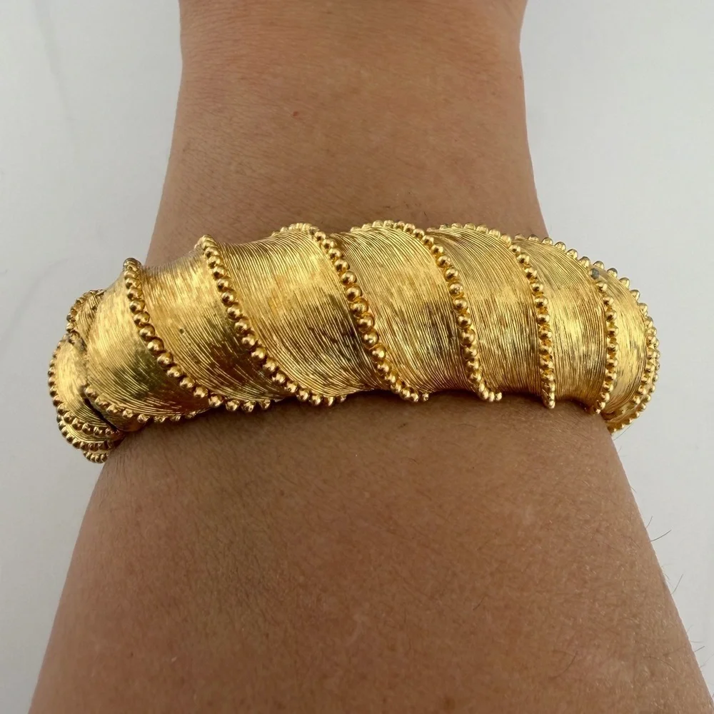 Vintage Monet textured gold bangle bracelet 1960-1970s